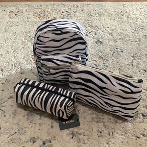 Zebra backpack and cosmetic bag
